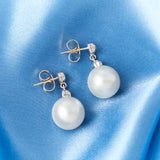 A Pair of South Sea Pearl & Diamond Earrings