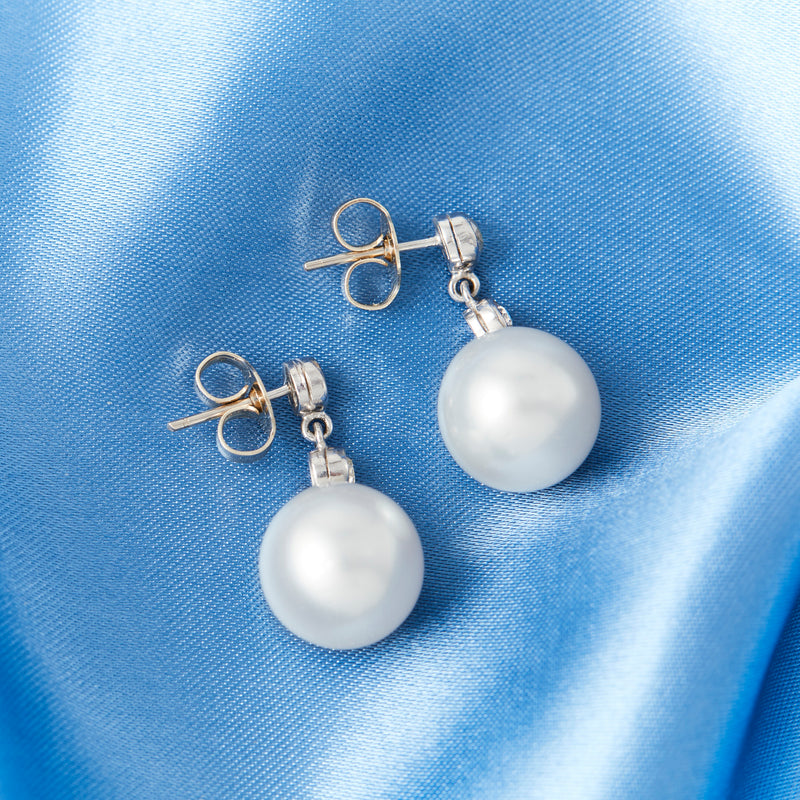 A Pair of South Sea Pearl & Diamond Earrings