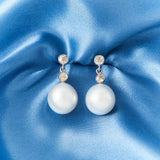 A Pair of South Sea Pearl & Diamond Earrings