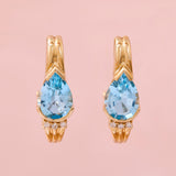 Modern 14ct Yellow Gold Blue Topaz & Diamond Post & Omega Clip Earrings.