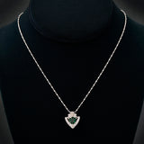 Modern Platinum Tsavorite Garnet & Diamond Pendant.