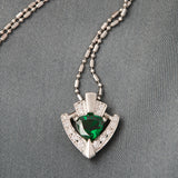 Modern Platinum Tsavorite Garnet & Diamond Pendant.